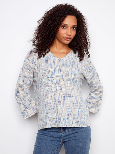Soft mist-colored sweater with a V-neck, showcasing 3/4 sleeves for a relaxed fit by Charlie B.