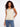 Gold sweater cami with a charming white heart detail, perfect for a chic look by Charlie B.