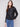 Black faux leather jacket featuring a sleek hook-and-eye closure by Charlie B.