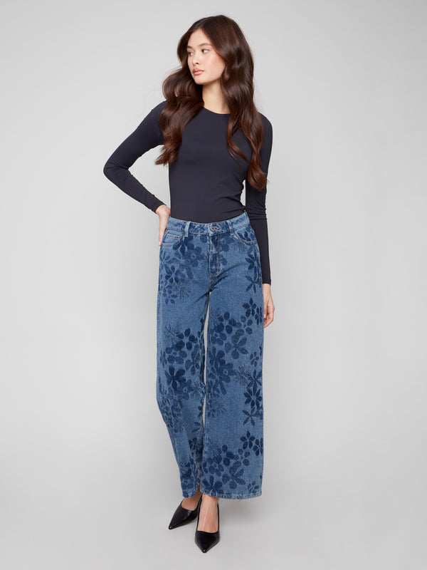 Floral jacquard patterned blue jeans with wide legs and regular rise, offering both style and versatility by Charlie B.
