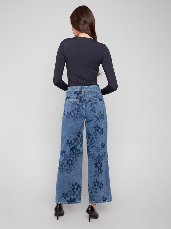 Regular rise blue jeans adorned with an intricate floral jacquard pattern, ideal for everyday elegance by Charlie B.