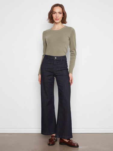 These jeans feature an extra-wide leg design, perfect for a bold statement. Crafted from stretch denim for comfort by Charlie B.