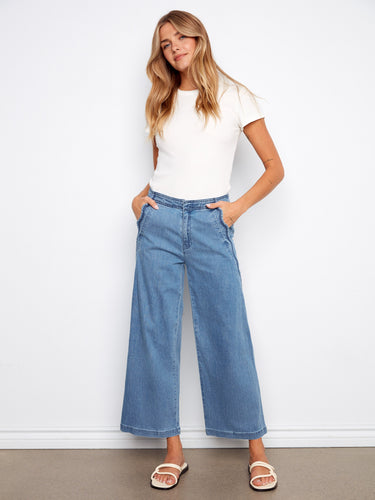 Blue wide-leg jeans with scalloped edges and a flattering regular rise. Crafted from stretch denim for comfort by Charlie B.