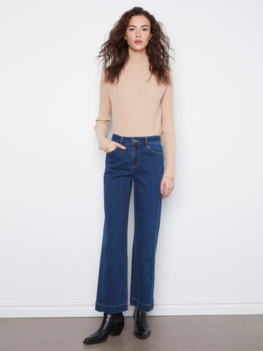 These jeans feature a stylish wide leg design, perfect for modern fashion enthusiasts. Crafted with care by Charlie B.