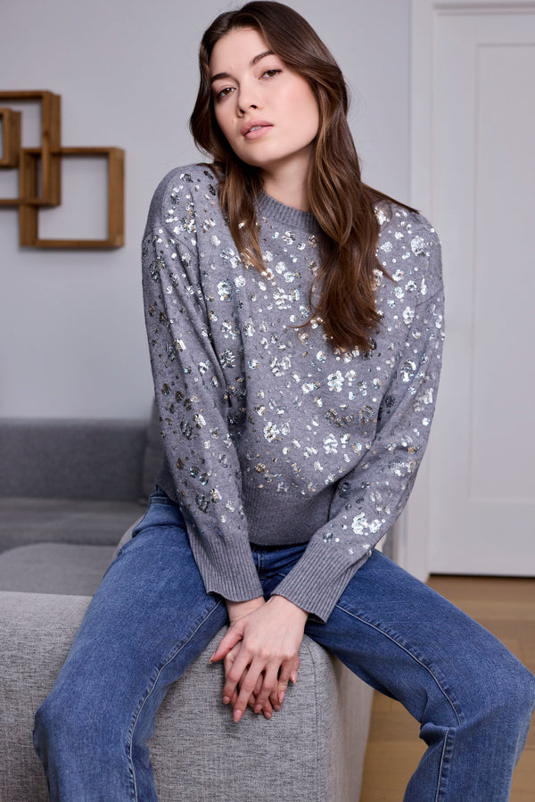 Fashionable dark heather grey sweater adorned with shimmering sequins, perfect for any occasion by Charlie B.