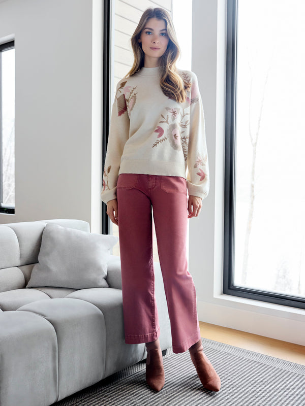 Mock neck sweater in heather natural tone, adorned with florals by Charlie B.