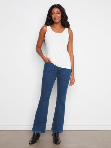 Classic white tank with scoop neckline, crafted for comfort and style. An essential addition to your closet by Charlie B.