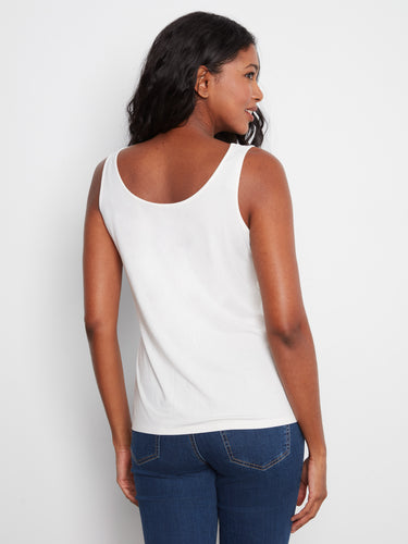 Stylish sleeveless tank with scoop neckline in crisp white, perfect for layering or wearing alone by Charlie B.