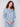 Long-sleeved blue knit top with comfortable relaxed fit and charming ditsy print by Charlie B.