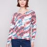 Relaxed fit pink tie-dye knit top featuring a V-neck design, perfect for casual outings by Charlie B.