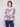 Elegant drop shoulder design on this long-sleeved pink tie-dye knit top adds flair by Charlie B.