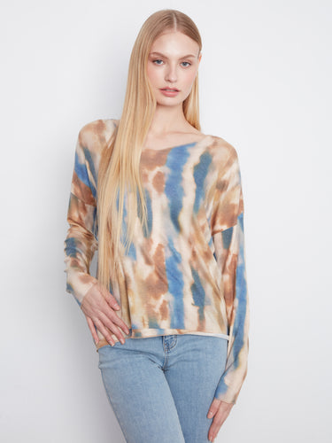 Knit top with a V-neckline and abstract pattern in earthy tones, perfect for casual wear by Charlie B.