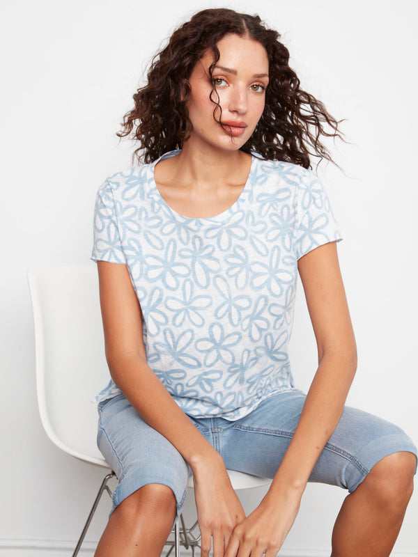 Elevate your casual look with this 100% cotton T-shirt adorned with an eye-catching floral print and crew neckline. By Charlie B.