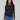 Black long-sleeve top with a crew neck, featuring a sleek fit and super stretchy fabric by Charlie B.