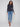 Black long-sleeve top with a crew neck, featuring a sleek fit and super stretchy fabric by Charlie B.
