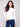 Natural long-sleeve top with a crew neck, featuring a sleek fit and super stretchy fabric by Charlie B.