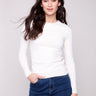 Natural long-sleeve top with a crew neck, featuring a sleek fit and super stretchy fabric by Charlie B.