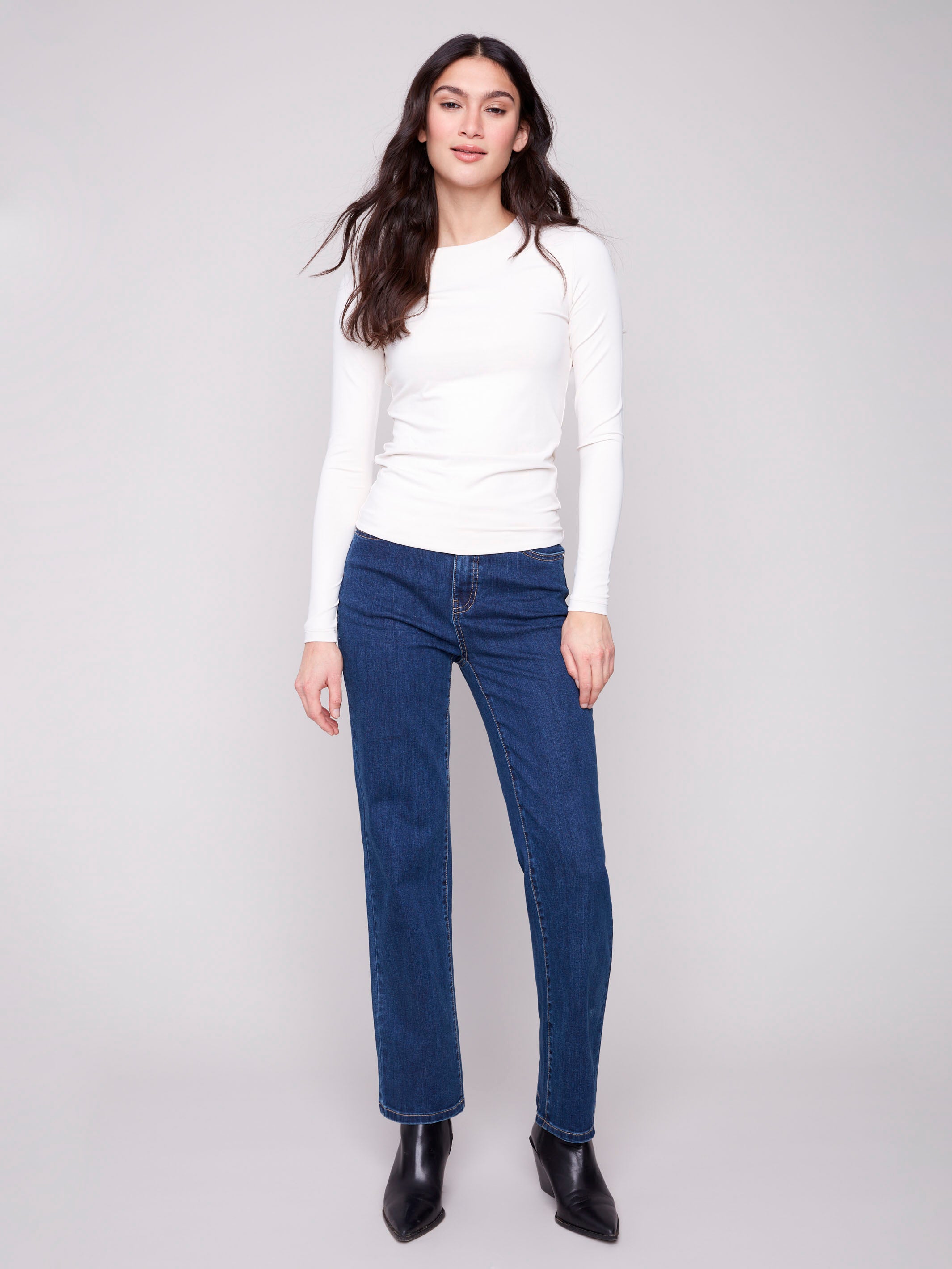 Natural long-sleeve top with a crew neck, featuring a sleek fit and super stretchy fabric by Charlie B.