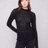 Elegant black top with long sleeves and a fitted silhouette, perfect for a chic look by Charlie B.