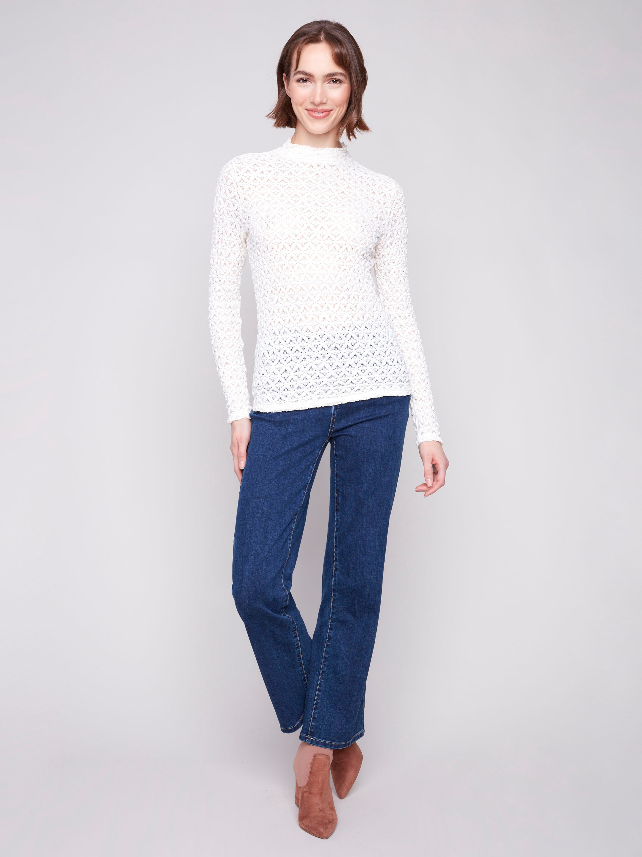 Stylish ecru lace top with semi-sheer design, perfect for a chic look by Charlie B.