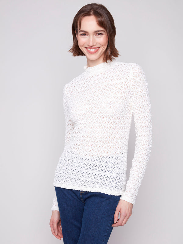 Intricate lace patterned top in ecru with a mock neck, offering a touch of sophistication by Charlie B.