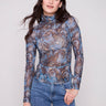 Midnight printed mesh long-sleeve top with a mock neck and side gatherings by Charlie B.