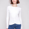 Ecru long sleeve textured knit top with a front knot by Charlie B.
