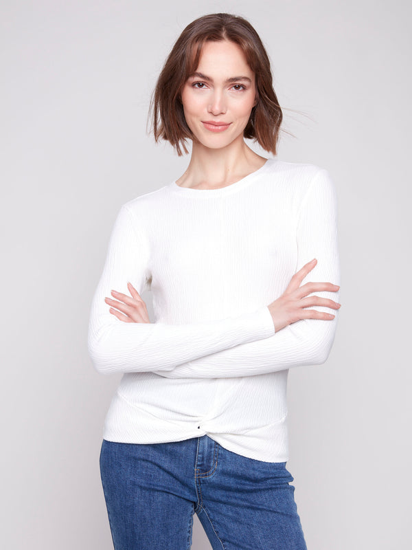 Ecru long sleeve textured knit top with a front knot by Charlie B.