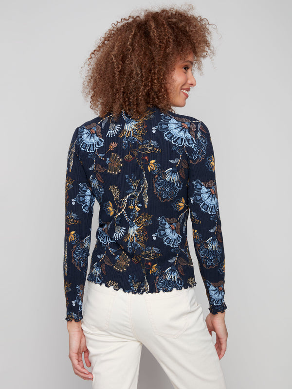 Elegant floral pattern on this mock neck top enhances its slim fit silhouette and stylish appeal by Charlie B.