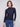 Blue black top featuring a slim fit and long sleeves, perfect for layering or wearing solo by Charlie B.