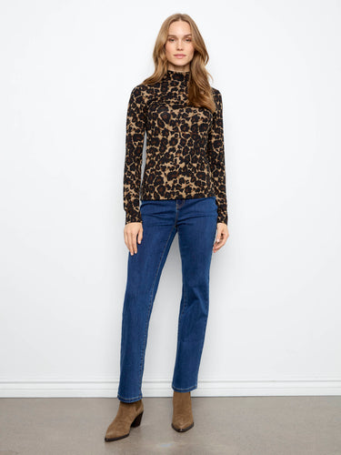 This slim fit top features long sleeves and a striking leopard design, ideal for stylish layering. By Charlie B.