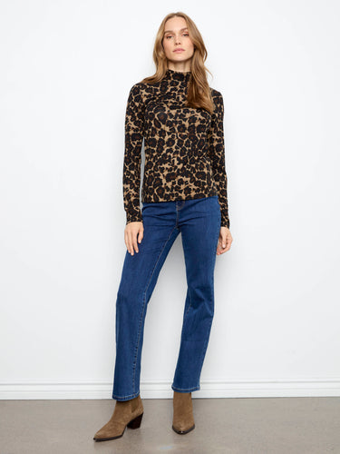 Stylish long sleeves complement the dynamic leopard design on this elegant yet casual top. Perfect for everyday wear by Charlie B.