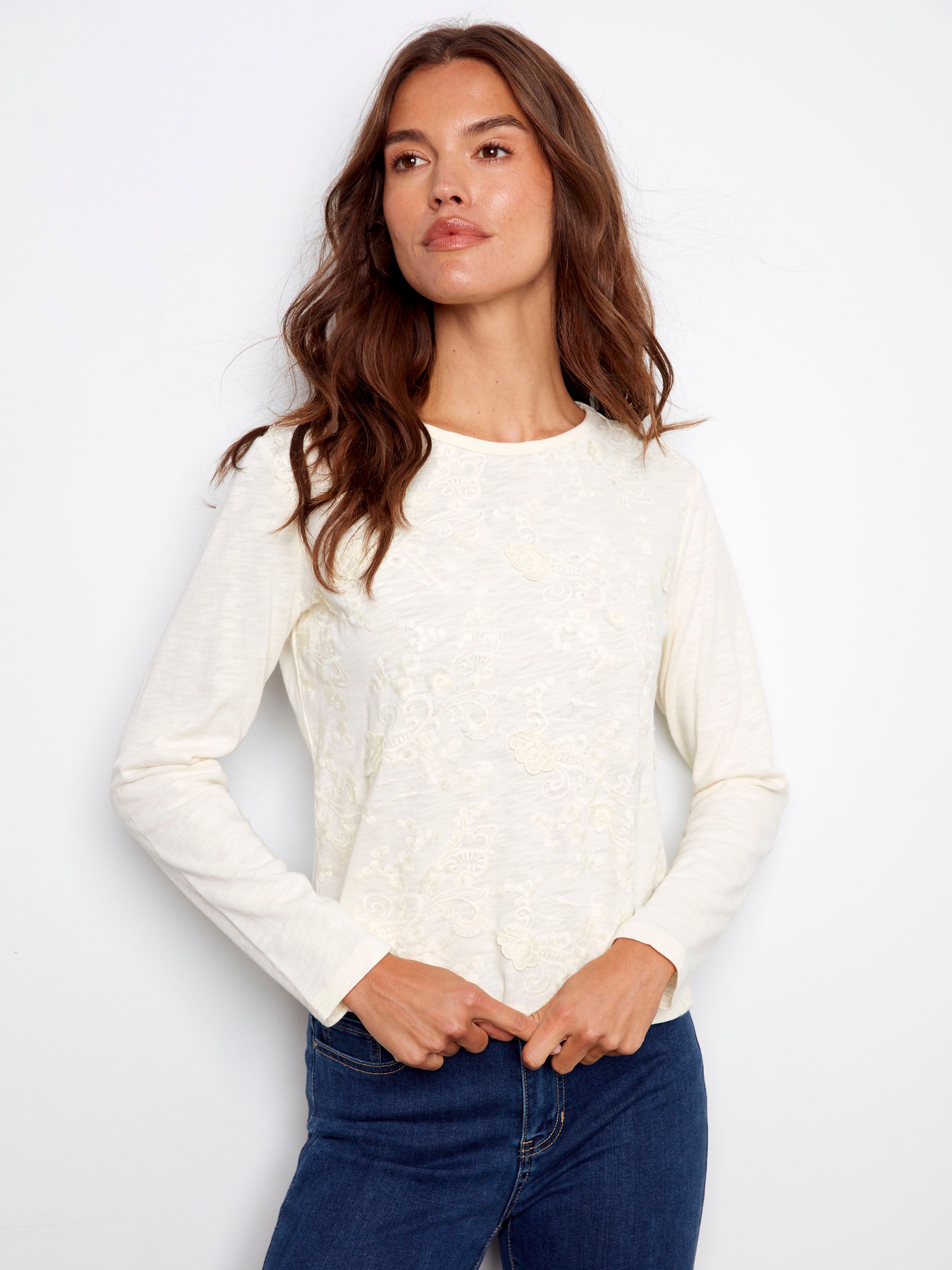 Ecru jersey top with floral embroidery, crafted from 100% cotton for comfort and style by Charlie B.