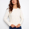 Ecru jersey top with floral embroidery, crafted from 100% cotton for comfort and style by Charlie B.