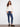This long-sleeve ecru top features a classic crew neckline and is made from soft cotton by Charlie B.