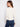 Elegantly embroidered ecru top with long sleeves, perfect for layering in any season by Charlie B.
