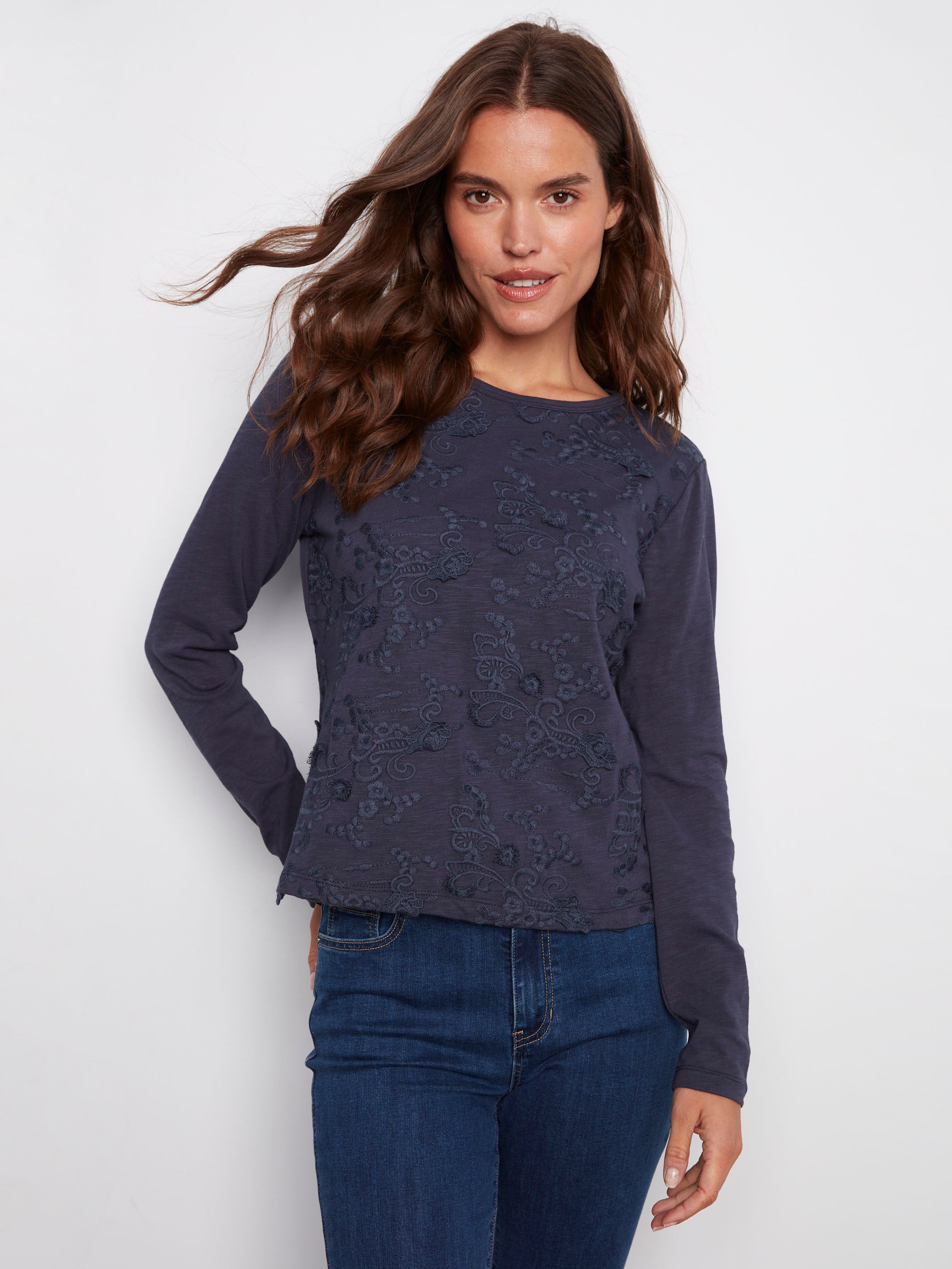 Moonlight jersey top featuring a classic crew neckline and intricate floral details by Charlie B.