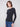 Chic long sleeve black top featuring a slim fit design, ideal for layering or wearing alone by Charlie B.