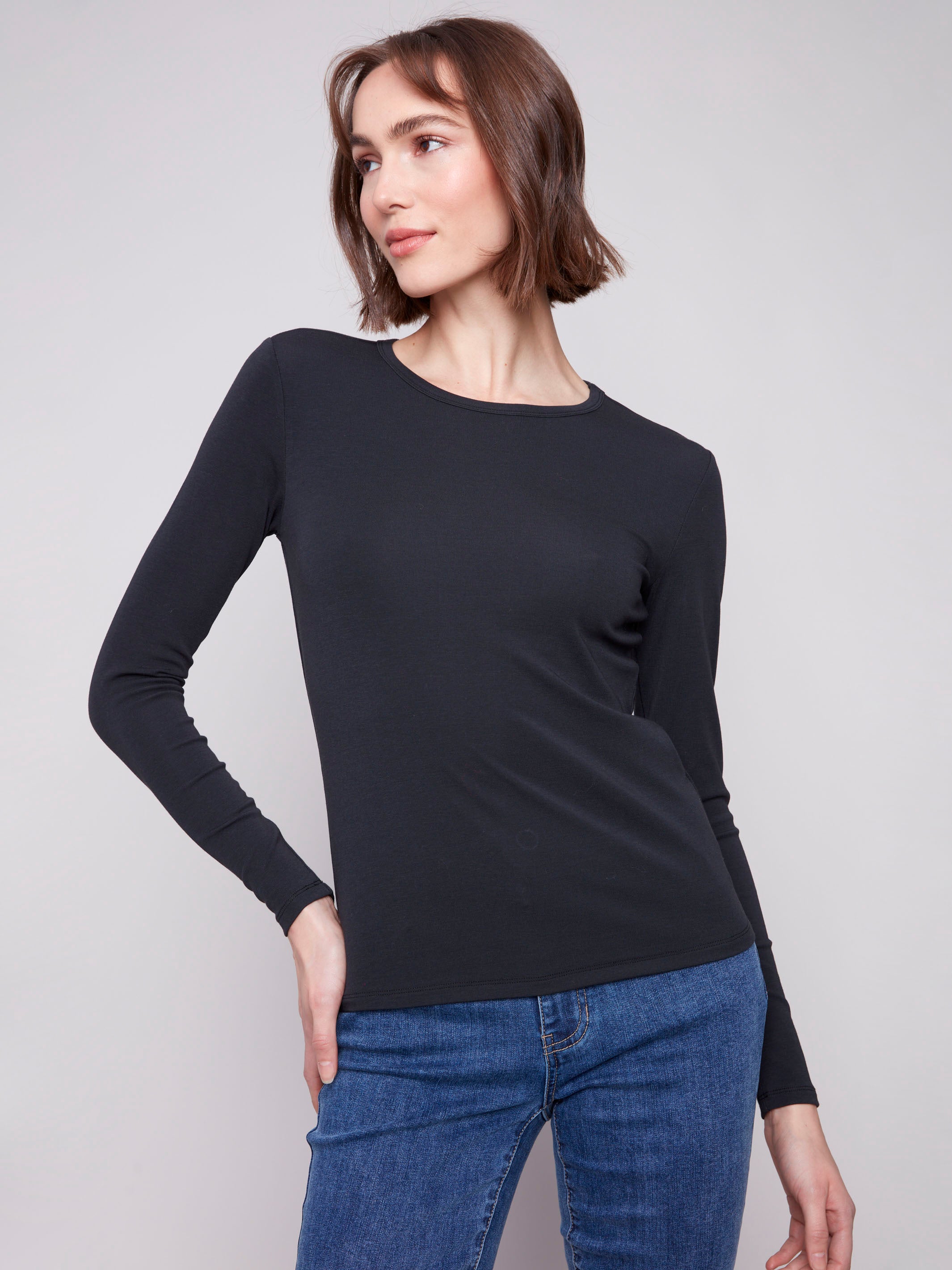 Elegant black knit top with a crew neckline and cotton blend fabric, perfect for any occasion by Charlie B.