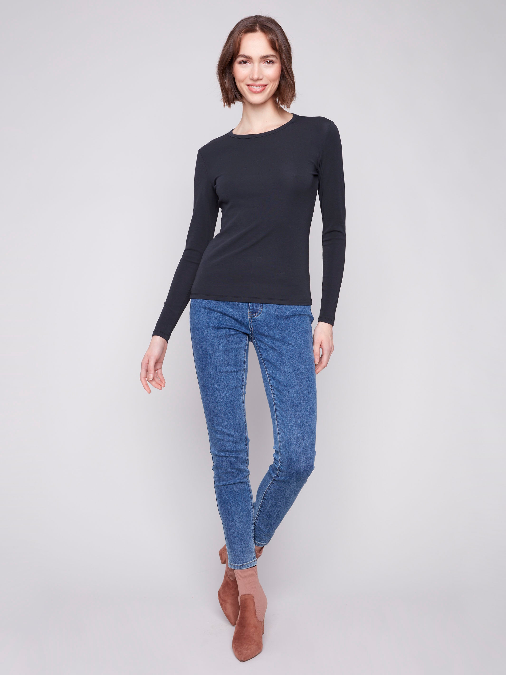 Stylish crew neck top in black with comfortable long sleeves, crafted from a soft cotton blend by Charlie B.