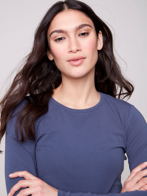Crew neck design in a cotton blend fabric, offering both elegance and ease by Charlie B.