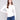 Ecru knit top featuring a stylish crew neckline, perfect for versatile styling by Charlie B.