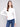 Ecru knit top featuring a stylish crew neckline, perfect for versatile styling by Charlie B.