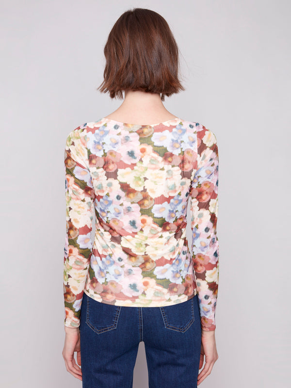 Stylish mesh top showcasing ruching at the sides, enhancing its modern appeal by Charlie B.