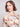 Vibrant floral design on this lined front and back mesh top adds a touch of elegance by Charlie B.