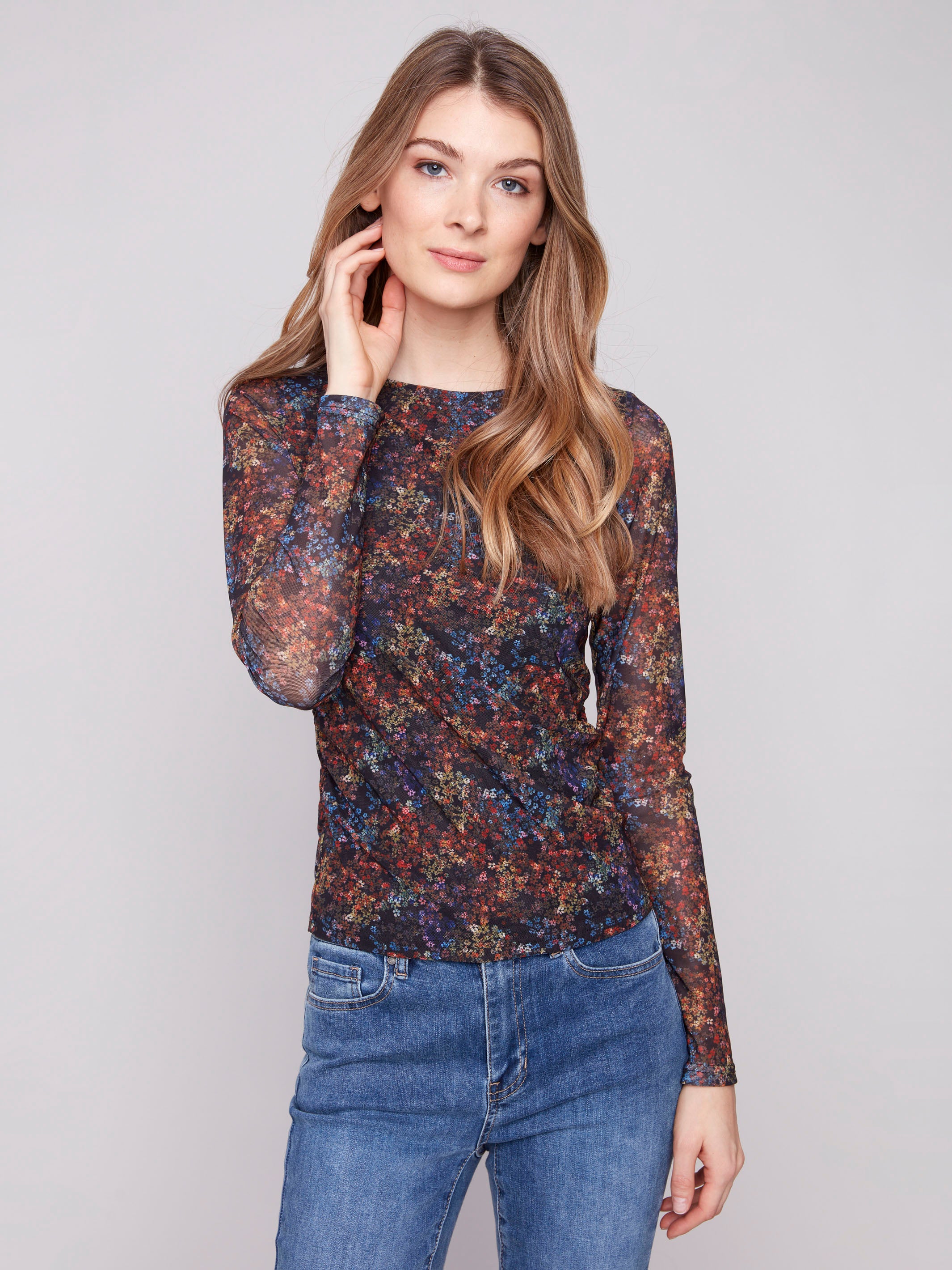 Slim fit floral mesh top with long sleeves and a delicate design by Charlie B.