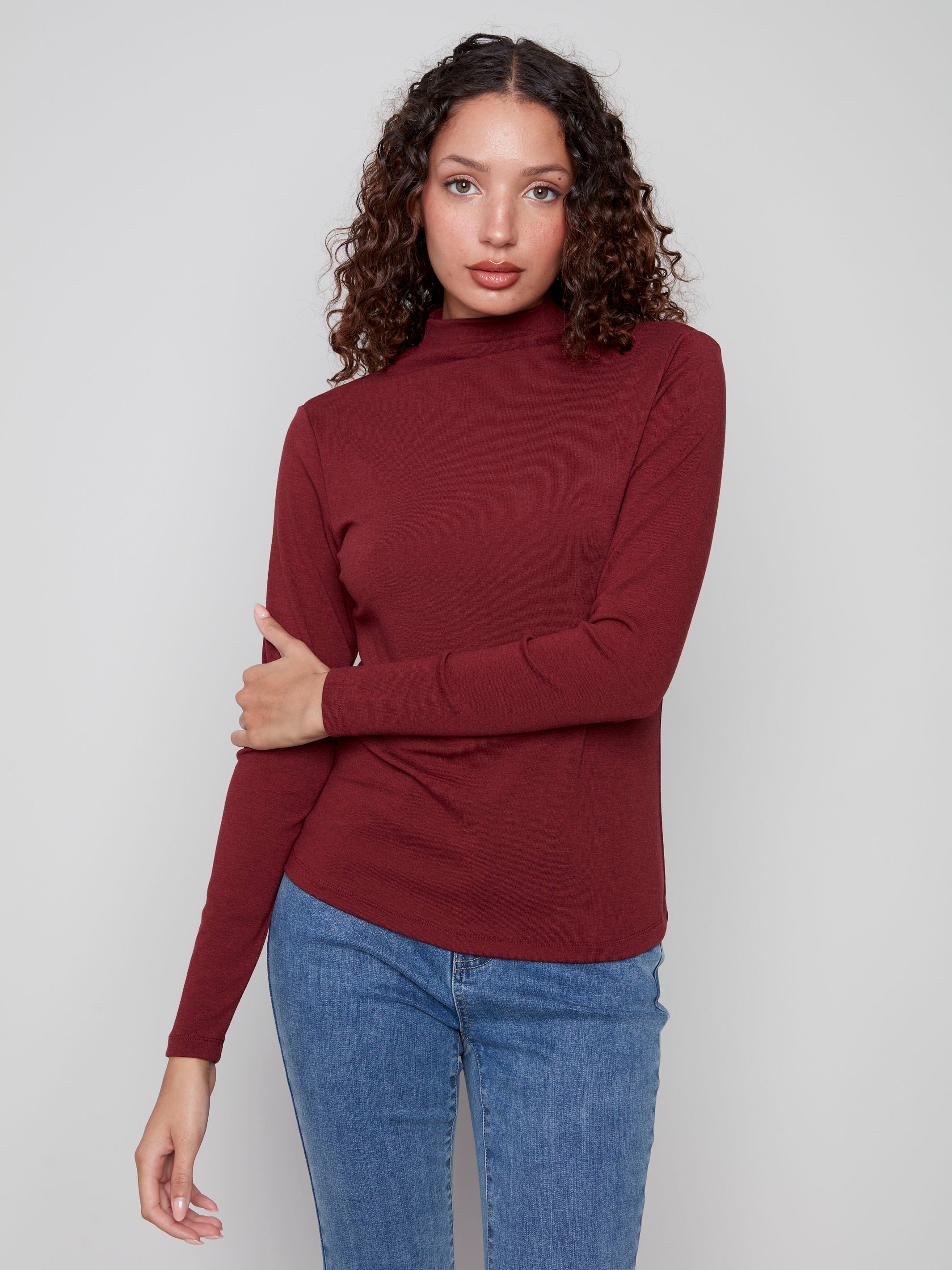 Elegant cabernet top featuring long sleeves and a sleek design by Charlie B.