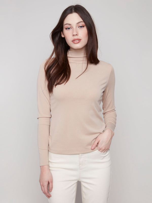Sesame top with a slim fit and long sleeves, perfect for layering by Charlie B.