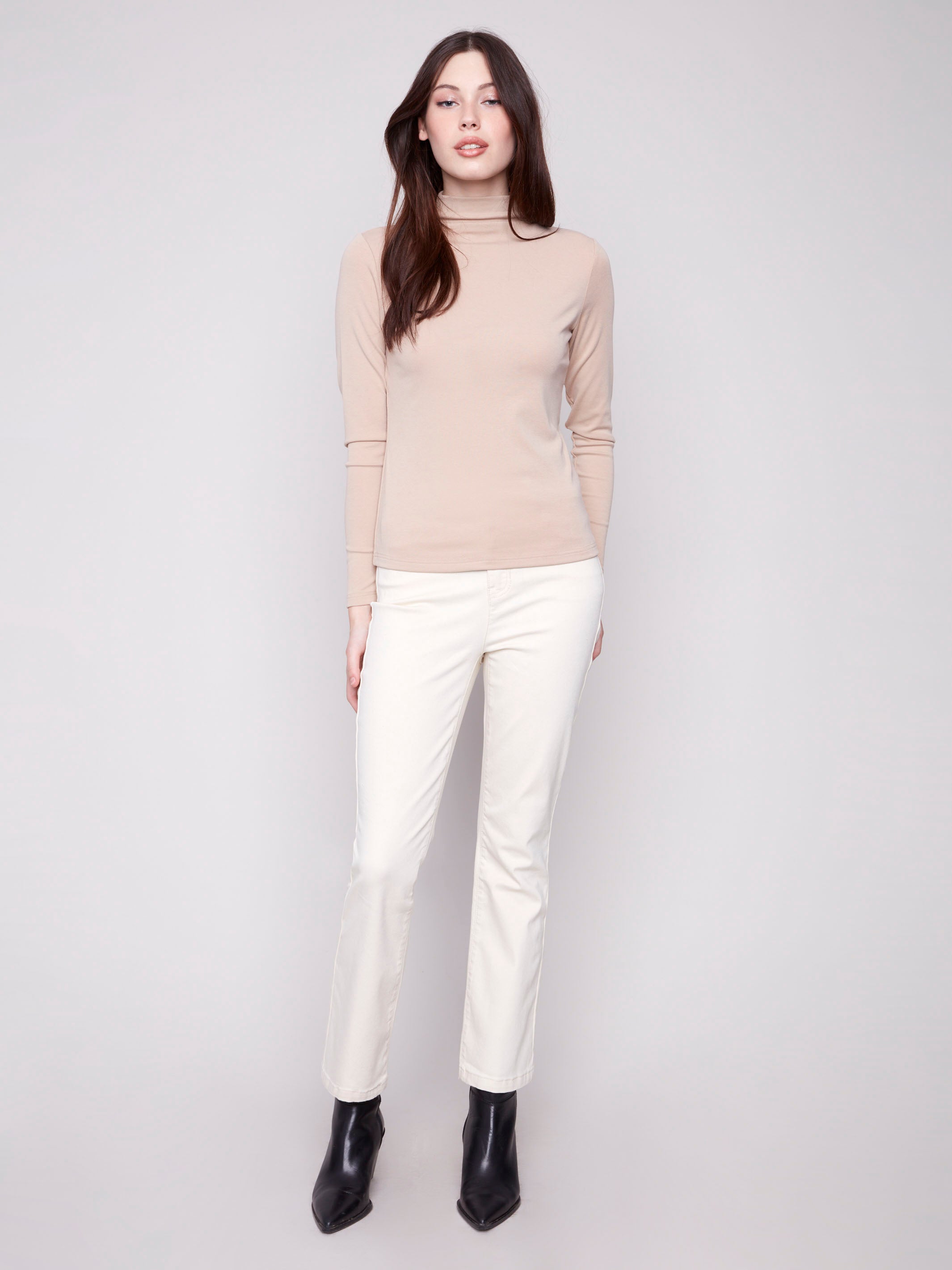 Elegant mock neck sesame top with a chic design by Charlie B.