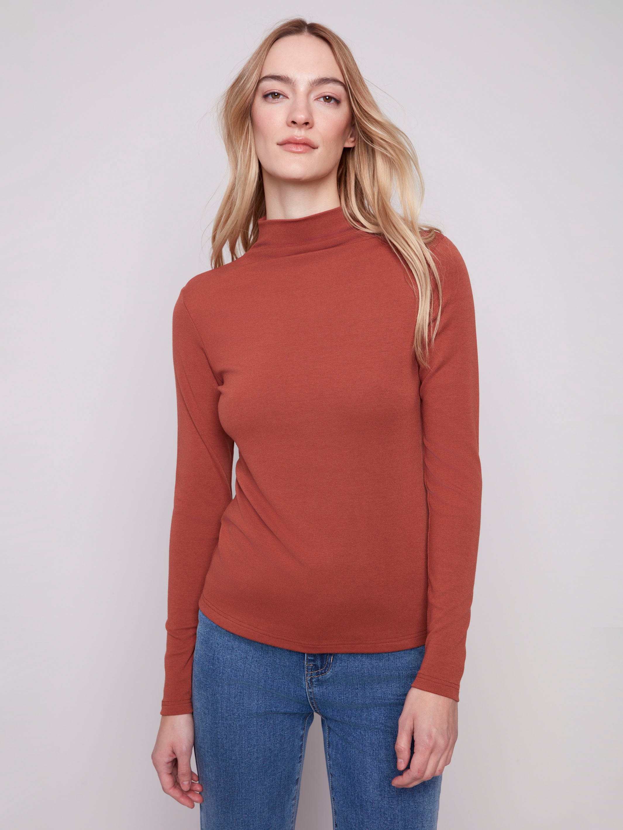 Sepia top featuring a slim fit design with long sleeves, perfect for layering. Crafted for comfort and style by Charlie B.
